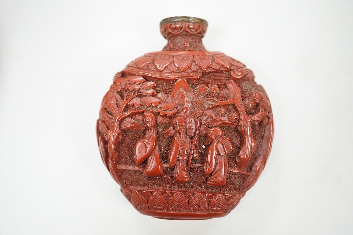 A Chinese cinnabar lacquer snuff bottle, a glass overlay snuff bottle and an underglaze copper red snuff bottle-9cm high (3)